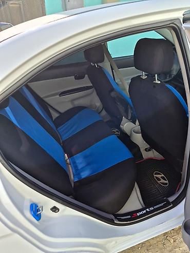 prius teker: Hyundai Accent: 1.4 l | 2009 il Sedan — 10