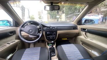 Chevrolet: Chevrolet Lacetti: 1.6 l | 2004 il Sedan — 3