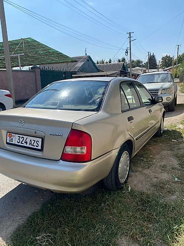 кпп «константиновка»: Mazda Familia: 2000 г., Автомат, Бензин, Седан — 1