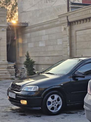 Opel: Model: Opel Astra G sedan Kuzov: 4 qapı, tünd yaşıl rəng Mühərrik və — 10