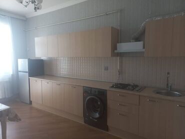 Uzunmüddətli kirayə mənzillər: Səbail rayonu, 20-ci sahədə Socarin binasında 18 mərtəbəli binanın — 7