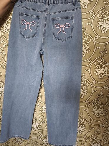 Cinslər: Məhsul: Qadın üçün denim şalvar - Rəng: Açıq mavi (light wash) - Arxa — 1