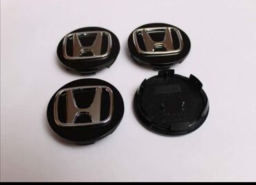 paket garder komada: Cepovi za alu felne Honda crni Precnik celog cepa je: 69mm Cena je za