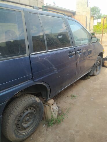 дом на колесах авто: Nissan Prairie: 1990 г., 1.8 л, Механика, Бензин, Минивэн
