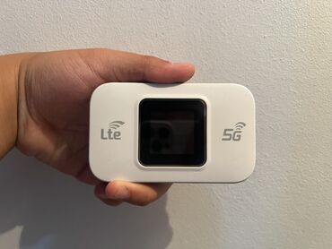карманый роутер: Портативный 5G/LTE Wi‑Fi роутер (модем) - Поддержка сетей 5G и 4G LTE