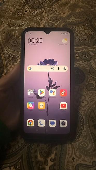 tp link 4g: Смартфон Redmi в чёрном цвете. На фото видно большой экран с — 1