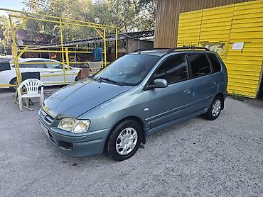 митцубиси спейс стар: Mitsubishi Space Star: 2001 г., 1.6 л, Механика, Бензин, Универсал — 1