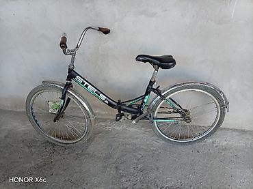 velosipedlər isma: STELS Pilot 24 şəhər/komfort tipli velosiped.Nasosda üstündə verilir — 4