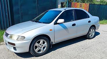 мата секыл: Mazda 323: 1997 г., 1.5 л, Кол менен иштөөчү, Бензин, Седан — 1
