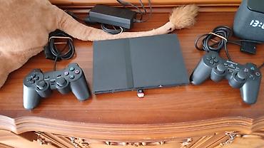 PS2 & PS1 (Sony PlayStation 2 & 1): Playstation 2 Super Slim Disk Yeri Ləğv Edilib Praşifkalıdı 64 GB — 1