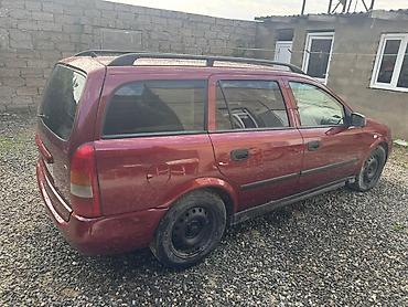 opel astra benzin: Opel Astra Caravan (Universal), qırmızı gövdə yalnız kredetlə — 10