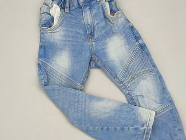 jeansy poszarpane na dole: Spodnie jeansowe, 4-5 lat, 104/110, stan - Dobry