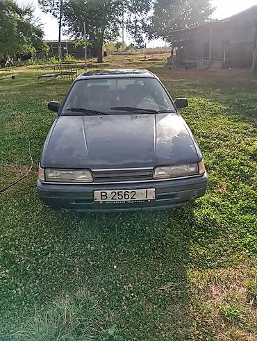 rox 01: Mazda 626: 1990 г., 2.2 л, Механика, Седан — 1