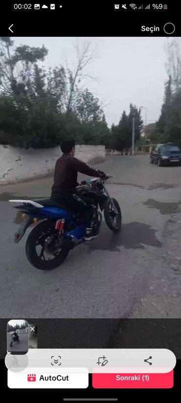 kvadrasikl satılır: Motosiklet satılır. Qara rəngdə, mavi oturacaqlı, şəhər içi və kənd