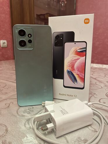 Xiaomi: Xiaomi 12, 128 GB, rəng - Yaşıl, 
 Sensor, Barmaq izi, İki sim kartlı