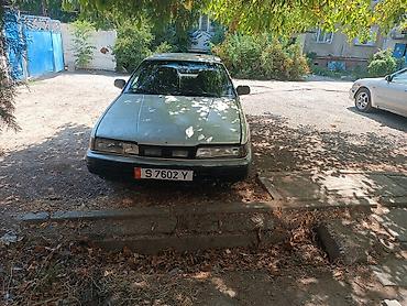 a4 b7: Isuzu Aska: 1990 г., Механика, Бензин, Лифтбек — 4