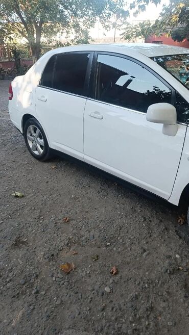 Nissan: Nissan Tiida: 1.8 l | 2011 il Sedan — 16