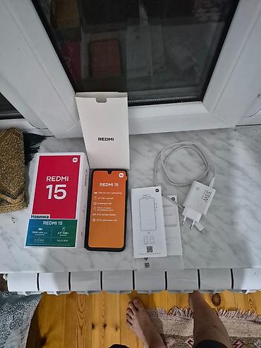 apple ipad 9: Xiaomi 15, 128 GB, rəng - Qızılı, 
 Barmaq izi, Face ID, Sənədlərlə — 1