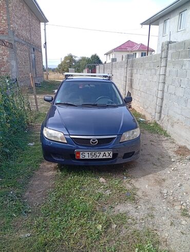 Mazda: Mazda Familia: 2002 г., 1.3 л, Механика, Бензин, Хэтчбэк