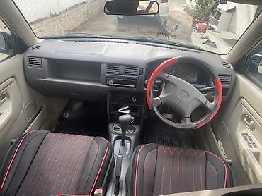 10 лет в одних руках: Mazda Demio: 1999 г., 1.3 л, Автомат, Бензин, Хэтчбэк — 7