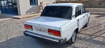 VAZ (LADA): VAZ 2107 sedan Xüsusiyyətlər: - Kuzov: 4 qapılı sedan, ağ rəng - — 4