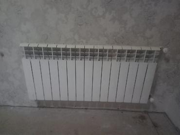 kombi aparatı: Kombi sistemi və radiatorlar - Divara quraşdırılan qaz kombisi — 1