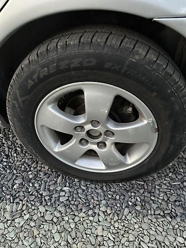 стекол: Mazda 626: 2000 г., 2 л, Автомат, Газ, Седан — 6