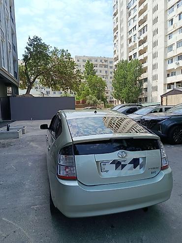 disk: Toyota Prius (2-ci nəsil) hibrid hetçbek - Rəng: açıq yaşıl/metalik - — 3