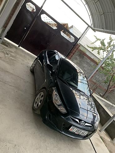 Продажа авто: Hyundai Solaris: 2013 г., 1.6 л, Механика, Бензин, Седан — 5