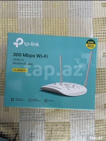 Modemlər və şəbəkə avadanlıqları: TP-Link TD-W8961N ADSL2+ modem-router. 300 Mbps sürətə malik Wi-Fi