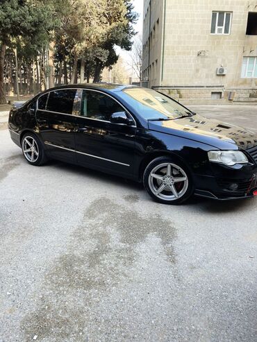 səs boqucu: Volkswagen Passat: 2 l | 2005 il Sedan