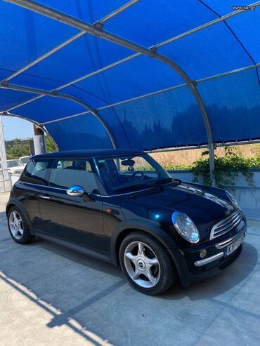 Mini Cooper: 1.4 l | 2004 year 237893 km. Coupe/Sports