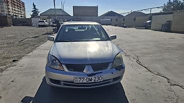 duman fara: Mitsubishi Lancer: 1.6 l | 2006 il 466000 km Sedan — 3