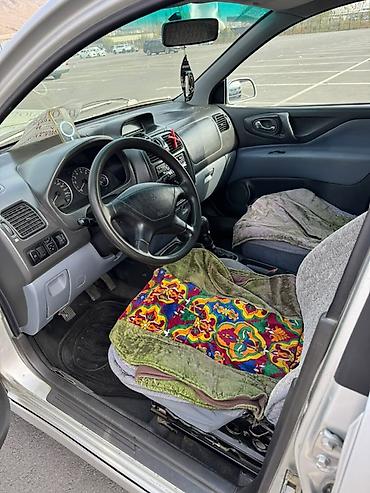 Mitsubishi Space Star: 2001 г., Механика, Бензин, Универсал