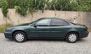 газ 69: Pontiac Grand Prix: 2001 г., 3.1 л, Автомат, Газ, Седан — 2