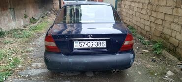 Hyundai: Hyundai Sonata: 2 l | 1997 il Sedan — 4