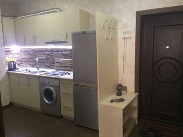 Uzunmüddətli kirayə mənzillər: Nərimanov metrosuna yaxin 14 mertebeli binanın 7-ci mərtəbəsində — 5