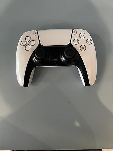 PS5 (Sony PlayStation 5): Игровая консоль Sony PlayStation 5 в белом корпусе с черными — 7
