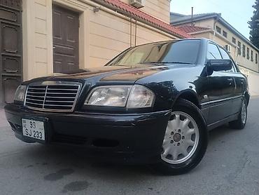 w202 on şuşə: Mercedes-Benz C‑Class (W202) sedan - Kuzov: qara rəng, 4 qapılı sedan — 9