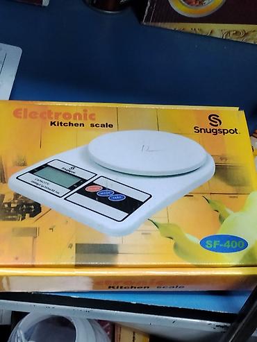 Электронные кухонные весы Snugspot SF-400. - Платформа круглой формы