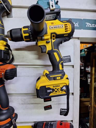 лазерный дальномер: Аккумуляторная дрель-шуруповерт DeWalt в черно-желтом корпусе
