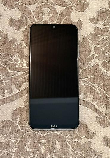 tecili satilan telefonlar: Xiaomi 64 GB, rəng - Ağ, 
 Barmaq izi — 2