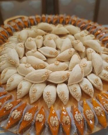 Sifarişlə əl işləri: $əkərburanin 1 dənəsi 1 m, paxlavanın 1 kq 16 m, badamburanin 1 dənəsi — 3