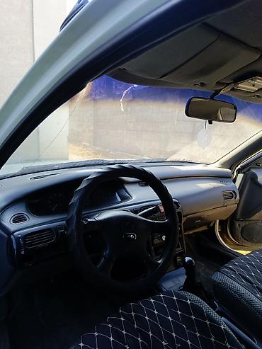 авто портер: Mazda Cronos: 1992 г., 1.8 л, Механика, Бензин, Седан — 5
