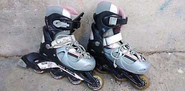 powerslide roleri: Roleri Action podesivi br. 30-33, sa pertlama i silikonskim tockovima — 1