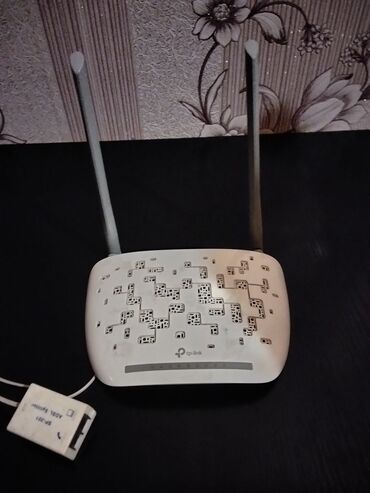 nar wifi modem satisi: TP-Link Wi‑Fi router - Marka/model: TP-Link (iki antenalı). - Növ