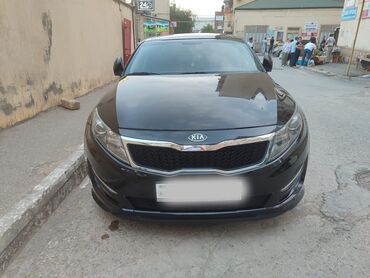 qırmızı maşınlar: Kia K5: 2 l | 2010 il Sedan