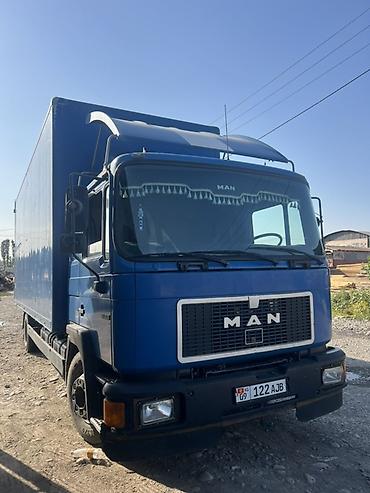 chery icar: Грузовой автомобиль MAN, тентованный фургон синего цвета. Ман 14.232 — 2