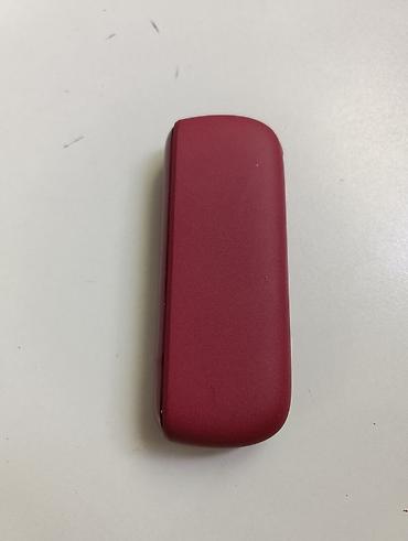 IQOS elektron tütün cihazı – qırmızı (bordo) rəngdə. Xüsusiyyətlər: -
