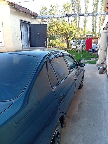 тунуке бу: Toyota Carina E: 1995 г., 1.6 л, Кол менен иштөөчү, Бензин, Седан — 4
